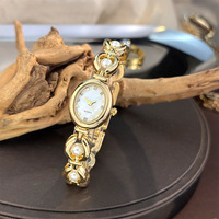 Montre bracelet ovale aspect perle, montre à quartz luxueuse et exquise avec surface en nacre NW0090