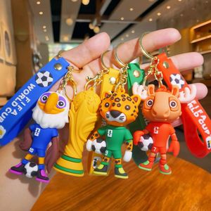 Porte-clés mascotte de la Coupe du Monde FIFA 2026, pendentif en caoutchouc, ballon de football, trophée, cadeau portable pour les fans - Product Image 1