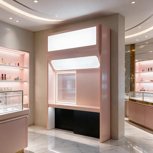 Vitrine de présentation sur pied rose Millennial avec éclairage supérieur intégré et comptoir encastré pour boutique - Product Image 1