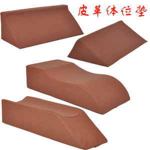 Coussin de posture triangulaire ergonomique en cuir pour le soutien du dos et le soulagement lombaire - Product Image 1