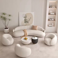 Canapé d'angle moderne en tissu courbé couleur crème, très confortable pour les petits appartements, les salons, les hôtels, les gymnases et les instituts de beauté