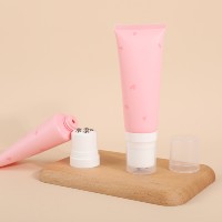 Tube multifonctionnel de compression de maquillage 100g120g avec interrupteur rotatif de tête de massage à 5 boules en alliage de zinc pour les soins du corps nettoyant