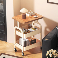 Chariot de rangement utilitaire moderne en métal à 3 niveaux, personnalisable pour la vente en gros, avec roulettes et verrouillage, servant également de table d'appoint, de chariot organisateur et de bureau mobile pour outils de salon