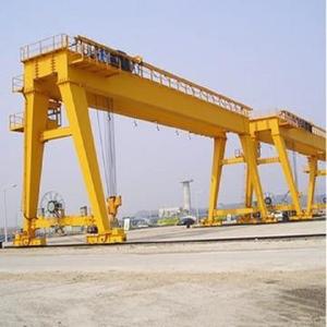 Grue à portique à hauteur réglable de 3m à 10m avec chariot télécommandé et structure en acier robuste pour une utilisation de levage industriel - Product Image 1