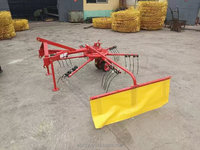Râteau à foin agricole monté sur tracteur haute performance de 2,5 m de large de la marque Yongyi, avec une durée de vie de 1 an, fabriqué en Chine, type de stockage foin/filet