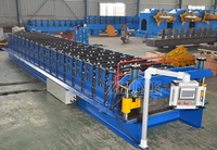 Machine de formage à froid de tôles métalliques à double couche haute vitesse pour la production de tôles de toiture GI PPGI