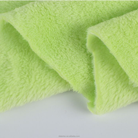 Delantex Tissu doux personnalisé Matière première textile 100 polyester Tissu polaire de flanelle solide pour couverture et vêtements Échantillon gratuit