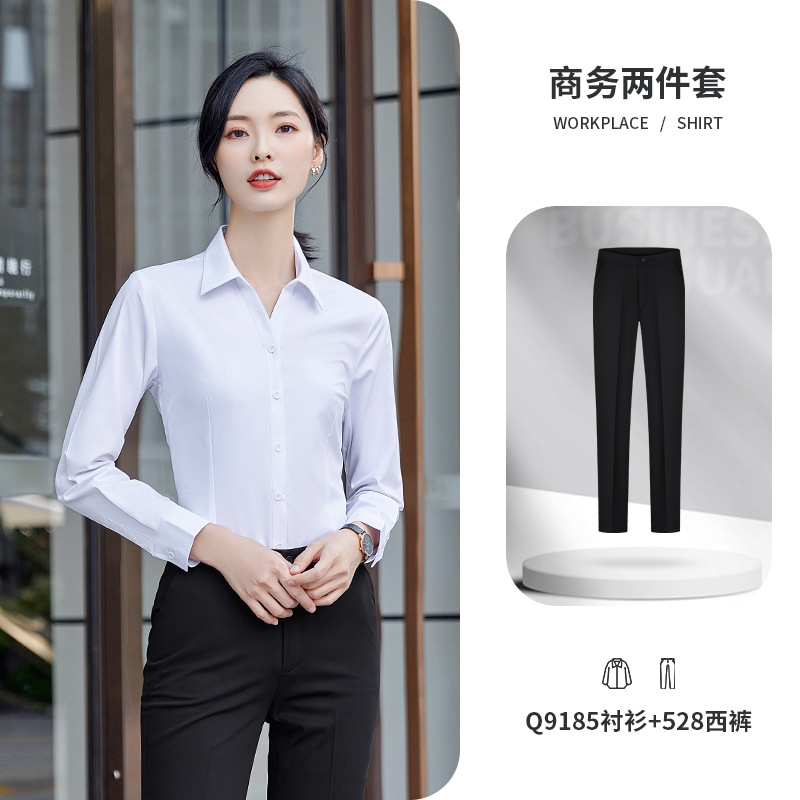 White long-sleeved shirt and black pants