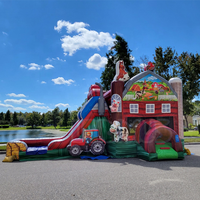 Château gonflable coloré sur le thème de la ferme avec toboggan et piscine à eau, location pour événements