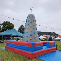 Mur d'escalade gonflable imperméable de qualité supérieure, idéal pour les événements sportifs, les fêtes et les activités de team building, disponible à la location