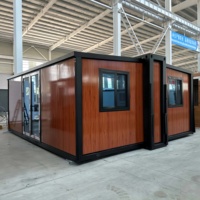 Maison conteneur extensible haut de gamme de 40 pieds, villa modulaire préfabriquée de luxe avec 2 ou 3 chambres, mur en verre, cuisine et salle de bain séparées