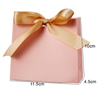 Boîte en papier rose pour chocolats, idéale pour les cadeaux de mariage et les fêtes, fabriquée par des fournisseurs chinois de Yiwu pour petites entreprises.