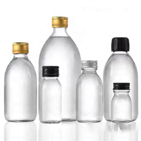 Bouteille pharmaceutique Bouteille en verre transparent 30ml 40ml 60ml avec bouchon Tampe Evidence 28mm pour boisson de jus de fruits