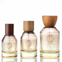 Flacon de parfum en verre à épaule inclinée personnalisé de 30 ml, 50 ml, 100 ml, fond épais, couvercle en plastique, estampage doré, sérigraphie