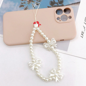 <span class=keywords><strong>Perle</strong></span> Téléphone Chaîne Petite Fleur <span class=keywords><strong>Pendentif</strong></span> Sangle Téléphone Cas Perlé Suspendu Ornement Arc Porte-clés Téléphone Accessoires En Gros - Product Image 2