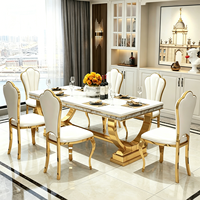 Table à manger en métal et marbre de luxe léger, table et chaises de style moderne minimaliste pour salle à manger domestique