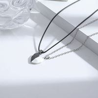 KISSWIFE Collier Magnétique Deux Âmes Un Cœur Pendentif Aimant Créatif en Pierre Souhaitée pour les Couples Amoureux Cadeau
