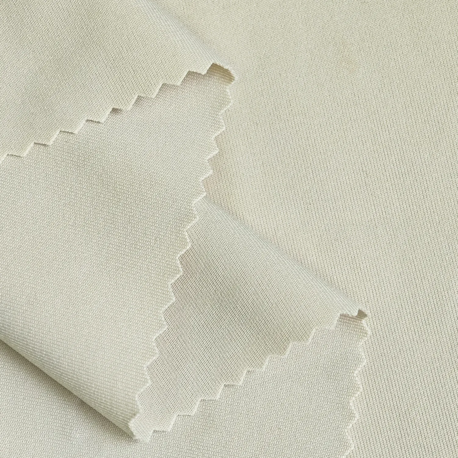 Yüksek kaliteli esneklik 4 yönlü streç 90% Polyester 10% Spandex örme interlok tüplü için venedik kumaş takım pantolon