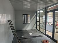 Maison modulaire préfabriquée à toit en pignon de 20 pieds, mur-rideau en verre moderne, villa portable, bureau, bâtiment commercial