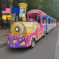2026 Direct usine Train électrique sans rail en acier pour enfants, pour parcs d'attractions, parcs à thème, centres commerciaux et écoles