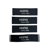 Großhandel Umweltfreundliche Maßgeschneiderte Buchstaben-Logo Gewebte Haupt-Kleidungsetiketten Patch-Rolle für Bekleidung