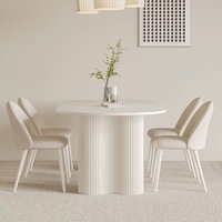 Ensemble de table à manger en pierre frittée de style moderne, luxe léger, stable, blanc pur, ovale, 6 places, avec chaises à pieds métalliques