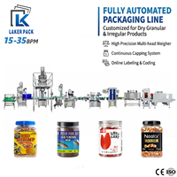 Ligne de remplissage automatique de granulés pour bouteilles et pots d'aliments pour poissons avec peseuse multi-têtes