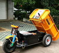 Chariot de transport de marchandises pliable en métal robuste à trois roues électrique pour chantier de construction, avec benne basculante hydraulique et capacité de franchissement de obstacles