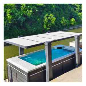 Copertura di Lusso per Piscina Swim Endless con Sollevamento Elettrico, Copertura di Sicurezza per Vasca Idromassaggio e Spa da Esterno con Avvolgitore, Copertura per Piscina Migliorata per Maggiore Sicurezza e Comfort - Product Image 1