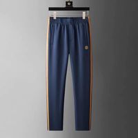 Ensemble deux pièces haut de gamme confortable et absorbant la transpiration pour homme, col rond, manches courtes, brodé