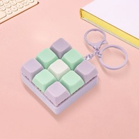 Porte-clés jouet en plastique anti-stress à presser, avec bouton populaire transfrontalier pour testeur de clavier
