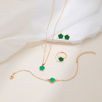 Ensemble de bijoux en alliage de trèfle porte-bonheur pour femmes 4 pièces collier bracelet anneau boucles d'oreilles cadeau de mode pour fête et usage quotidien