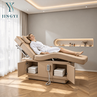 Lit de beauté électrique rembourré de luxe sur mesure, table de soin du visage chauffée, canapé de massage de spa, lit de massage de beauté pour esthétique