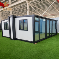 Maison Modulaire Préfabriquée à Cadre Noir et Mur en Verre, Couleur Personnalisable, 20ft 40ft, Vente Directe Usine, pour Hôtel, Bureau, Maison Conteneur Extensible