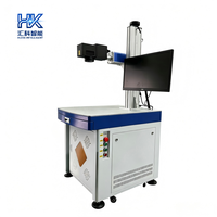 Máquina de Grabado Láser de Fibra CNC de Superficie Curva 3D Huike, 7000 mm/s, Precisión de 0.012 mm, Compatible con Formatos DXF/BMP/AI/DST