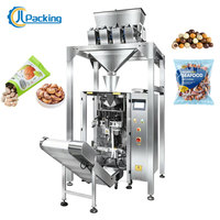 Machine d'emballage verticale automatique de haute précision à grande vitesse pour pistaches, pignons de pin, granulés, noix de cajou, chocolat, haricots
