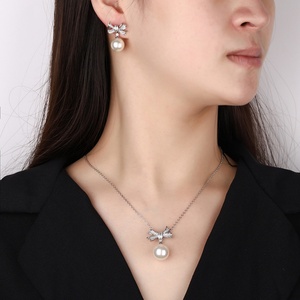 Wholesale Fashion Eco-friendly Copper 14-12mm White Shell Pearl Bow Design Anti Tarnish <b>Earring</b> Necklace <b>Set</b> for Women - Product Image 6
