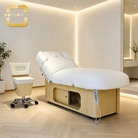 Lit de soin du visage de luxe au design moderne avec dossier entièrement réglable et armoire de rangement en bois, design avec trou pour le visage, pour salon de beauté