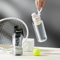 Bouteille d'eau sportive haut de gamme pour étudiants, idéale pour l'été et les activités de plein air, avec poignée portable en plastique et filtre à boire directement, 750/1000 ml, robuste