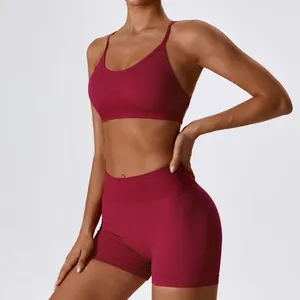 Sujetador deportivo en blanco personalizado de nailon 87% 13% Spandex sin espalda para mujer, Sujetador deportivo de realce activo con tiras elásticas para Yoga y correr