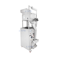 Machine d'emballage pneumatique automatique de 20 à 1200 g avec imprimante de date pour les chips de pommes de terre, les snacks croustillants, les biscuits