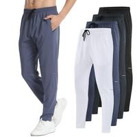 Pantalon d'entraînement tissé d'hiver pour hommes personnalisé Polyester respirant séchage rapide Camping pêche course à pied athlétique pantalon de survêtement actif