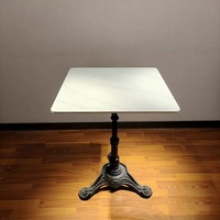 Table de restaurant d'extérieur pliable en marbre noir avec base métallique, idéale pour hôtels et salons – Vente en gros Chine