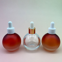Emballage cosmétique personnalisé en PET transparent 50ml 100ml Flacon d'huile essentielle rond unique avec compte-gouttes Impression sérigraphique OEM
