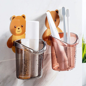 No-drill self-adhesive bear cup, wall-mounted bear hugging toothbrush cup holder, cartoon mouthwash cup holder. - Product Image 1