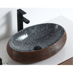 Lavabo de comptoir en céramique noire Ouni 600x405mm, ovale, bicolore, brossé, pour salle de bain d'hôtel - Product Image 2