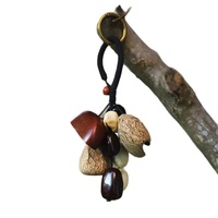 Grelot en forme de plante fait à la main en coquille de fruit naturelle, pendentif sonore pour sac à dos, clé de voiture