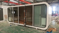 Maison capsule intelligente écologique Apple Cabin avec énergie solaire et design résistant aux intempéries pour la vie hors réseau