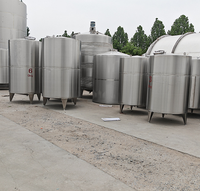 Nouveau conteneur en métal de stockage de liquide de réservoir fourre-tout d'IBC d'acier inoxydable 1000L avec le trou d'homme et la valve pour des industries de restaurant