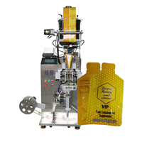 Machine à emballer verticale de sachet de lotion de crème au miel de forme irrégulière de liquide de machine de remplissage de jus concentré